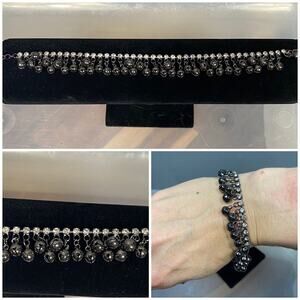 gunmetal silver colored chain and rhinstone dangle bracelet. 8.25” adjustable